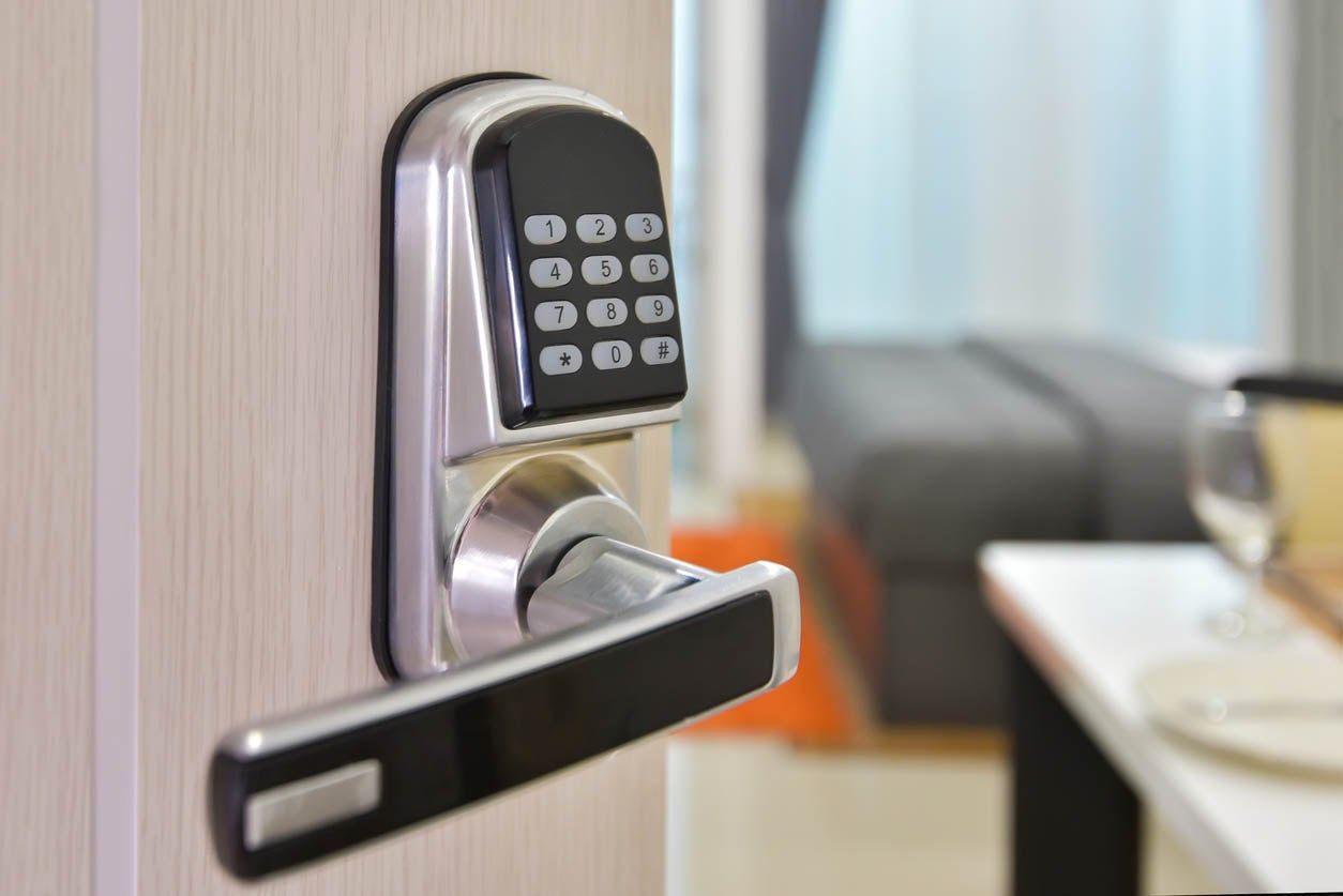 Electronic keyless door lock with keypad for secure access control.