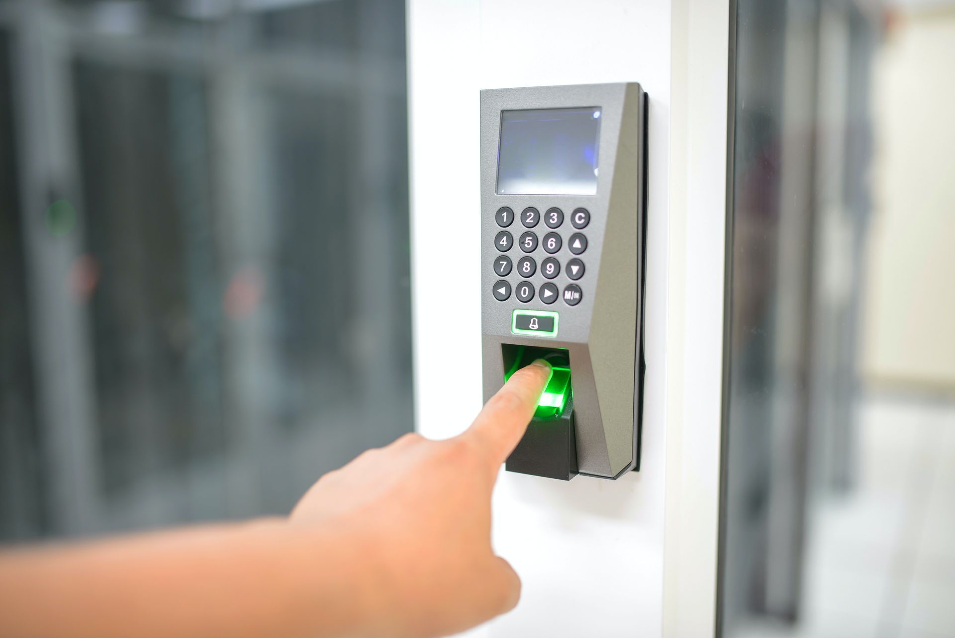 Finger scan with numpad door lock for secure access.