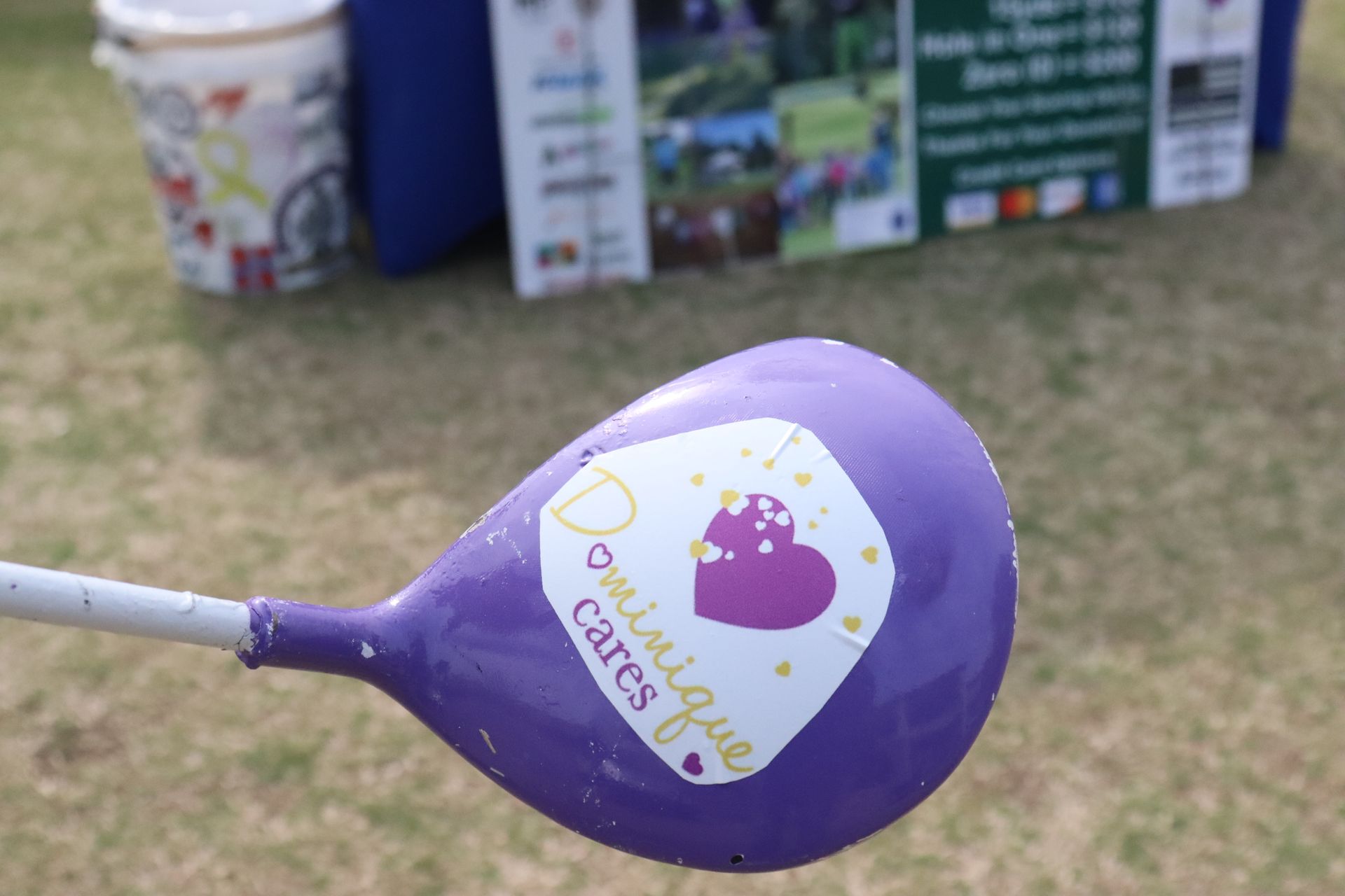 Purple golf club with 