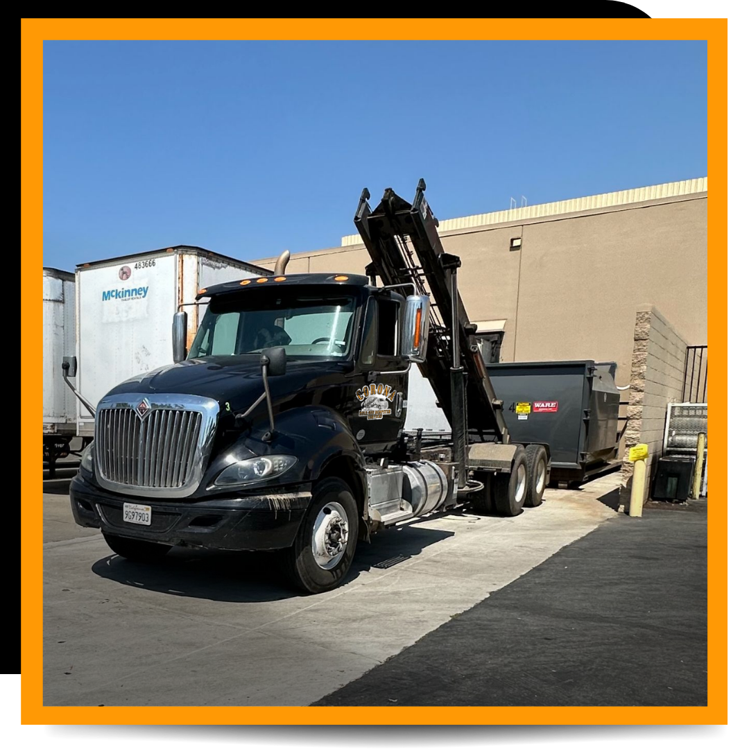 corona dumpster truck parked outside