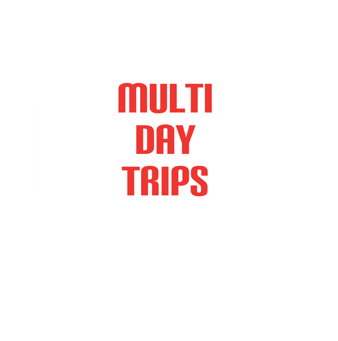 A red sign from Adventure Sports that says multi day trips '' on a white background.