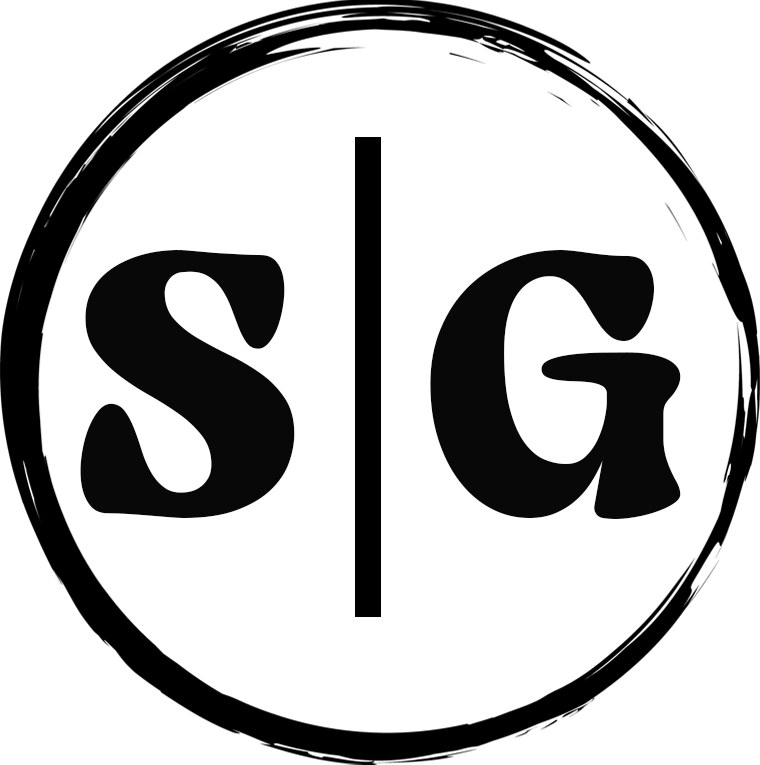 A black and white logo with the letter s and g in a circle near adventure sports