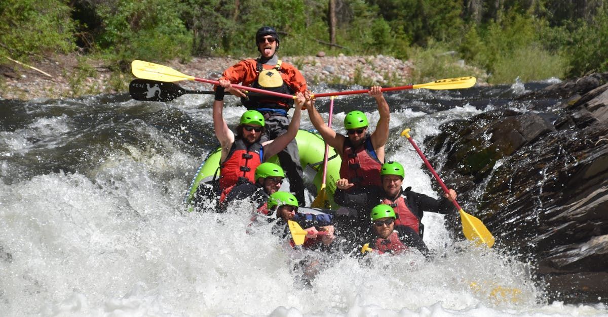 A group of people are rafting down a river.