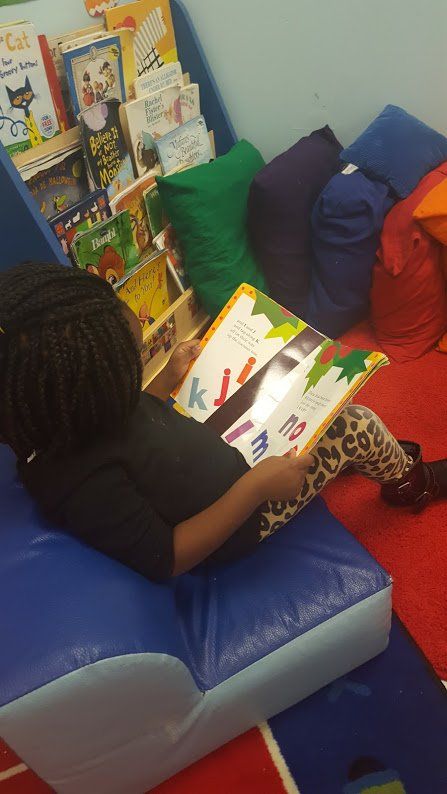 Child Care — Girl reading, Salem, MA