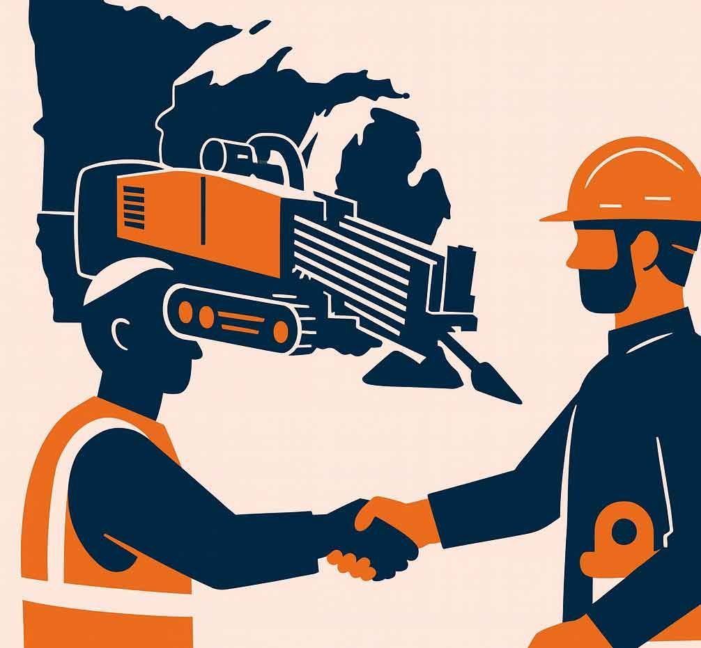 Two men shaking hands with a machine in the background