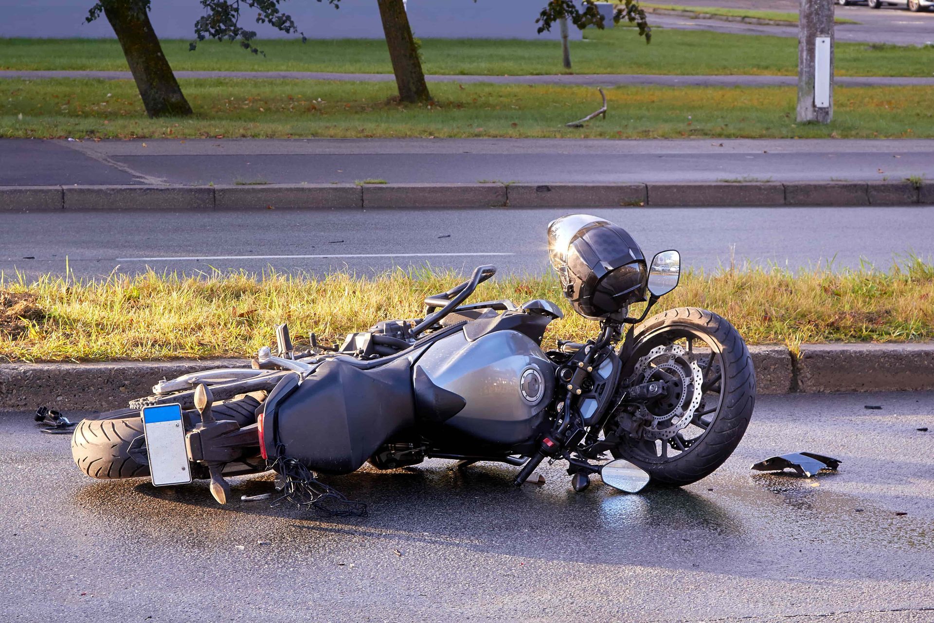 a motorcycle spilled on the ground