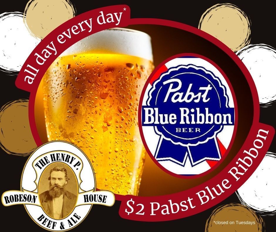 A glass of beer with a pabst blue ribbon logo on it