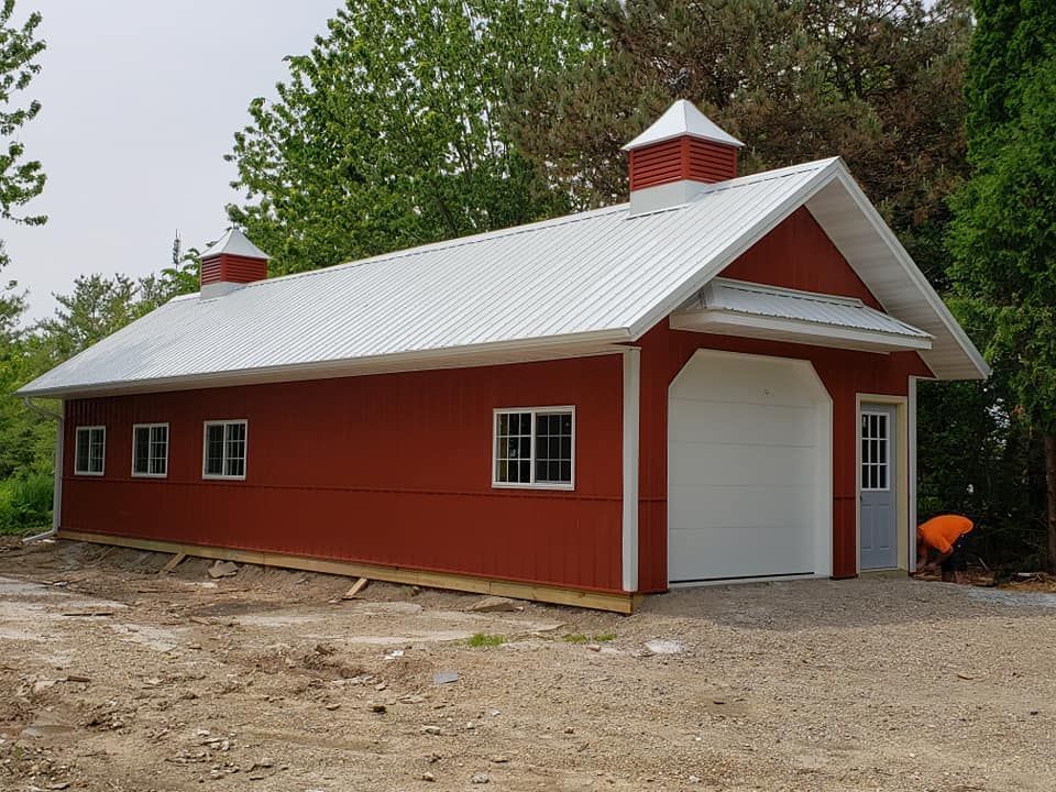 Custom built red and white garage in Milton, WI