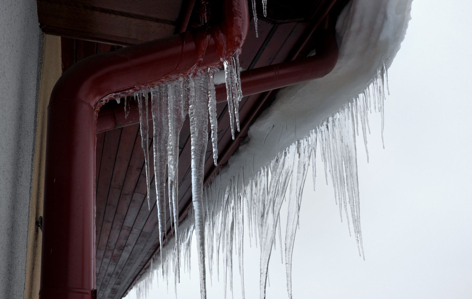 Ice hanging off a gutter