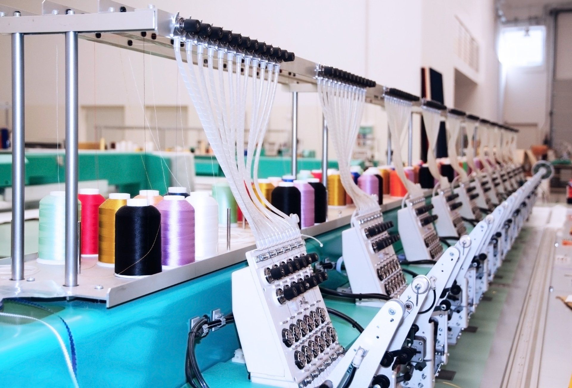 Embroidery Machine — Des Moines, IA — Fly Graphic Style
