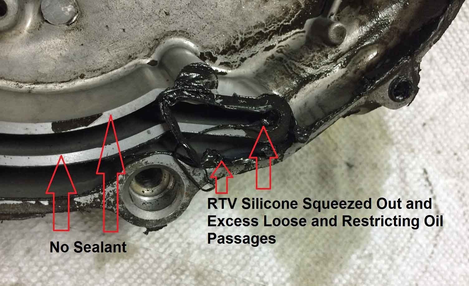 Gasket sealer squeezed out - Excess loose restricting oil passage