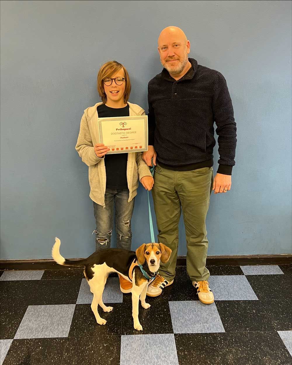 Father and Son with A Certificate — St. Louis, MO — PetImpact!