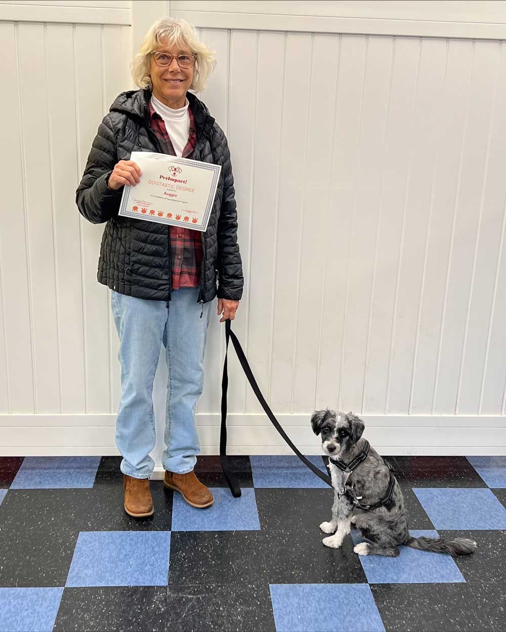 Woman and Her Dog with A Certificate — St. Louis, MO — PetImpact!
