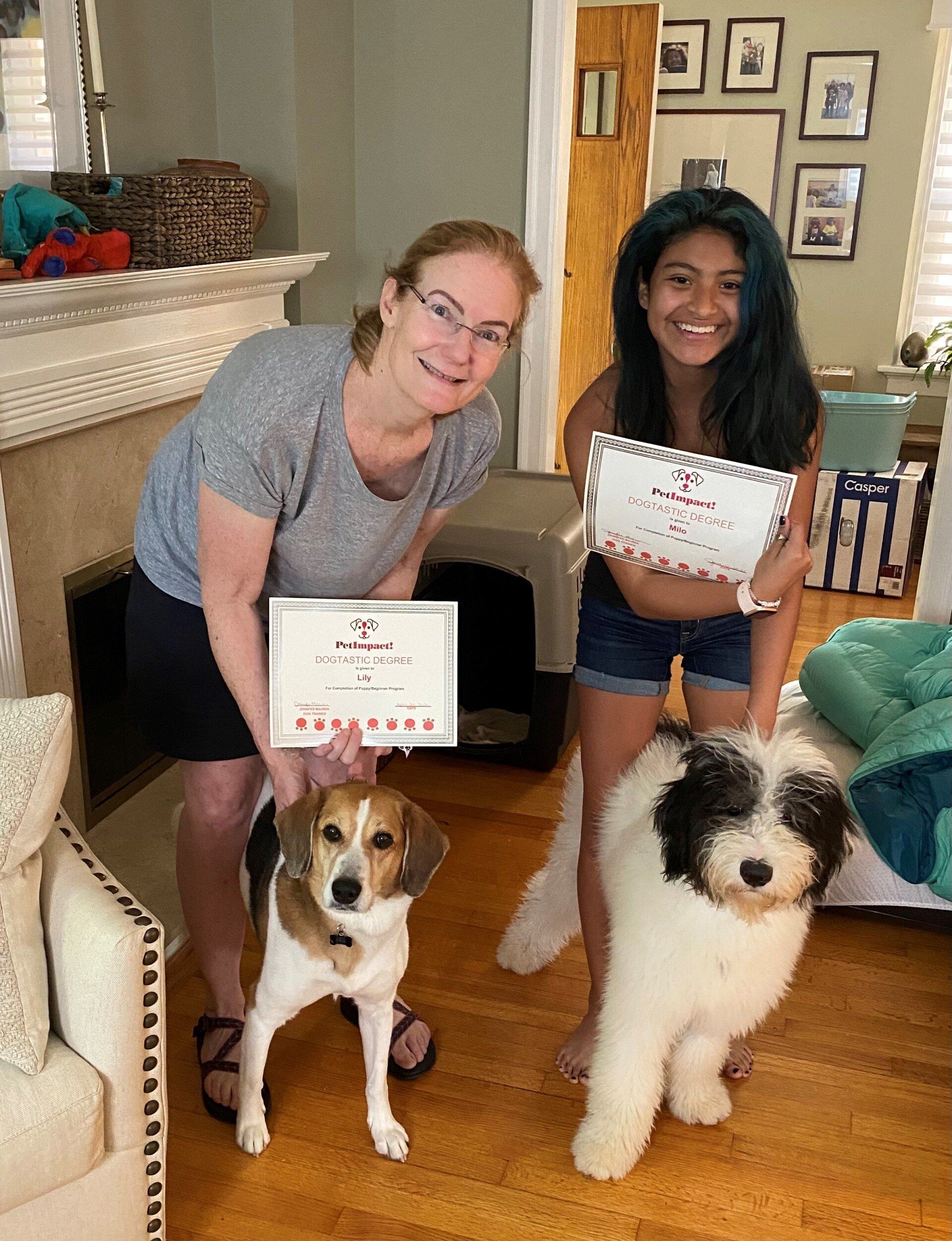 Pet Owners With Their Two Dogs — St. Louis, MO — PetImpact!