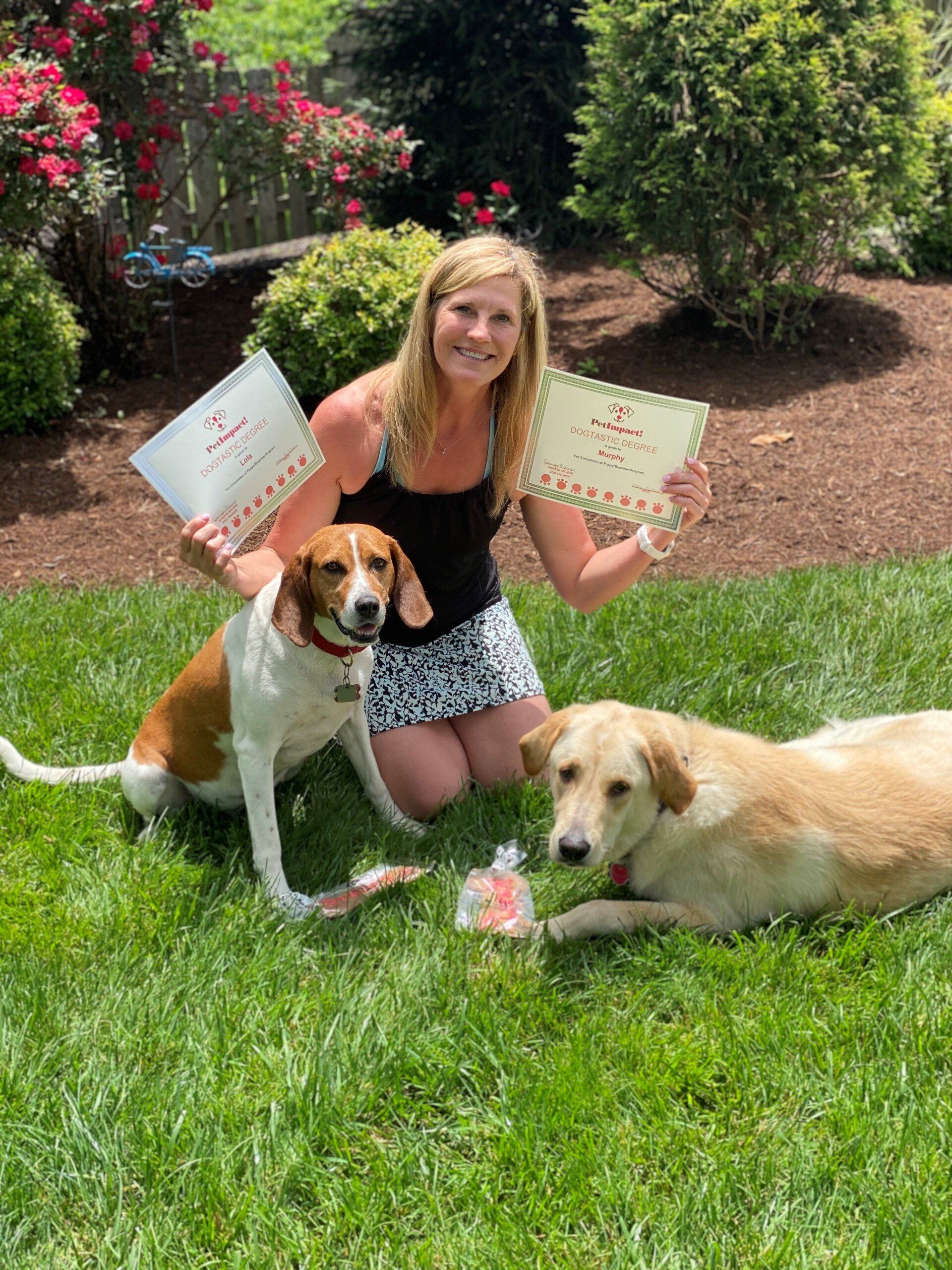 Pet Owner With Her Two Dogs In The Yard — St. Louis, MO — PetImpact!