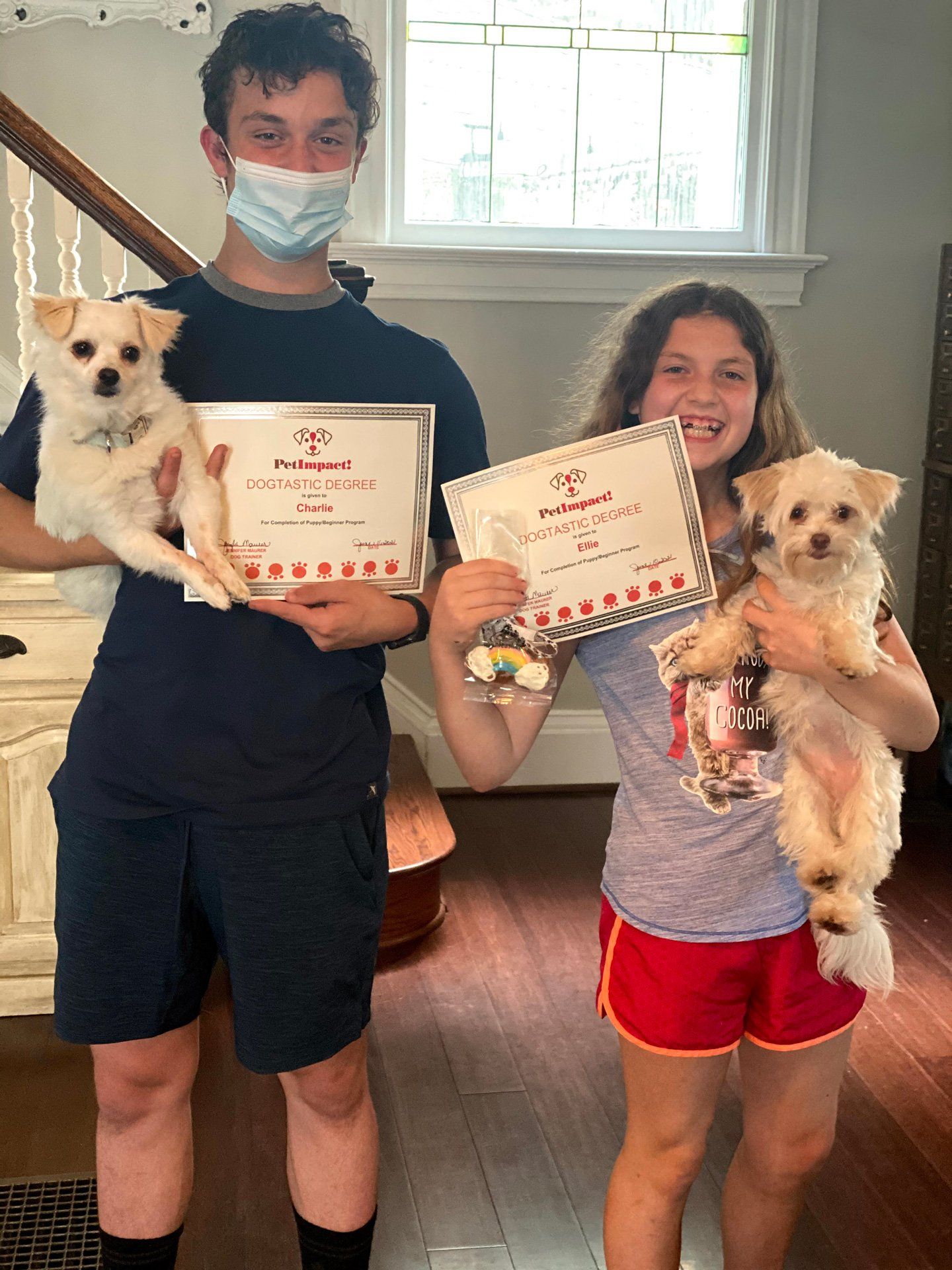 Siblings Holding Their Pets — St. Louis, MO — PetImpact!