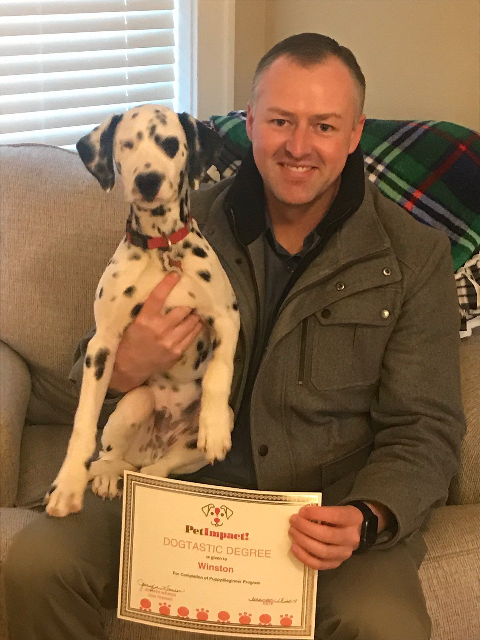 Happy man with Certificate — St. Louis, MO — PetImpact! Dog Training