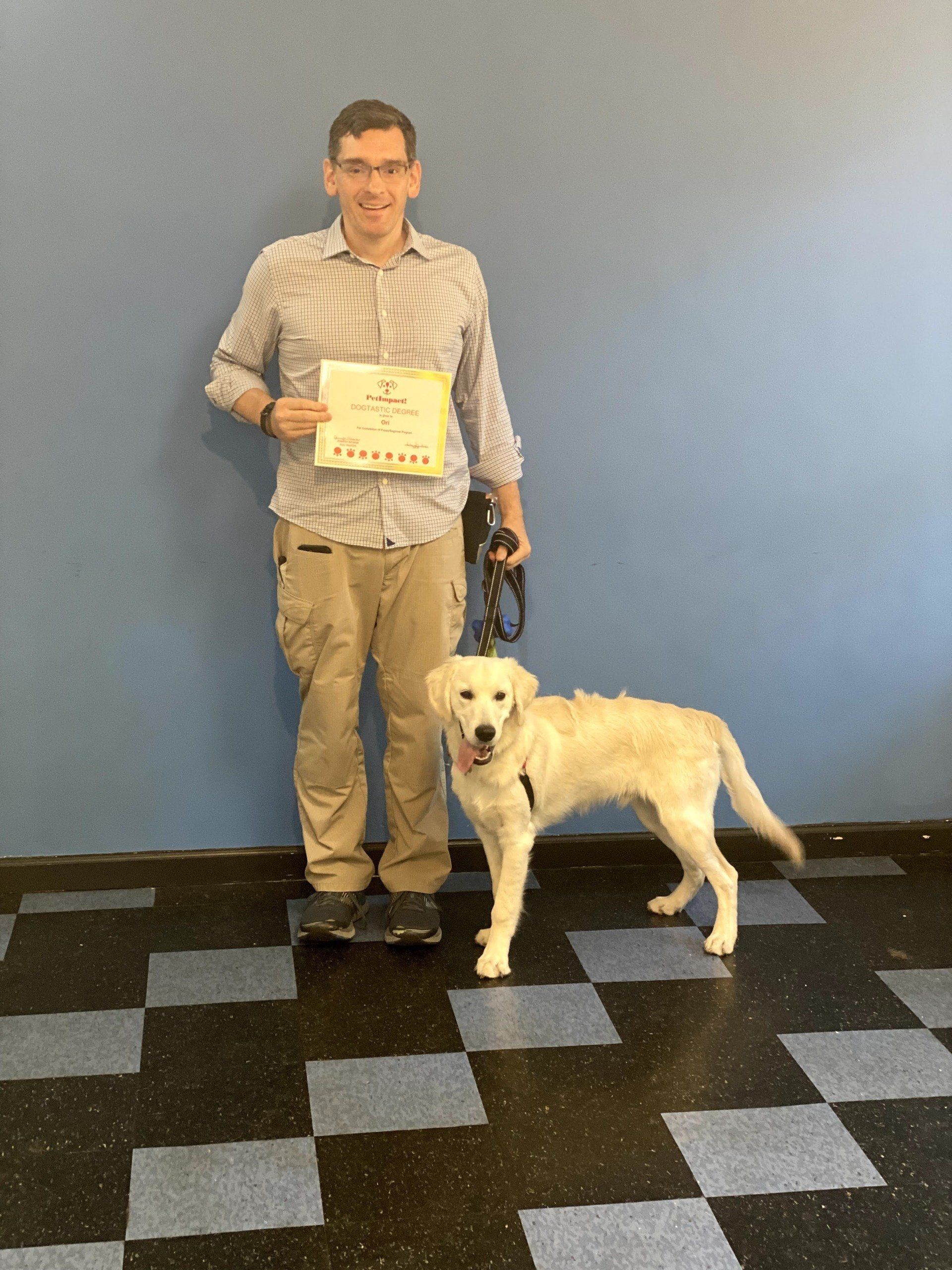 Cute Dog Graduate With His  Owner — St. Louis, MO — PetImpact!