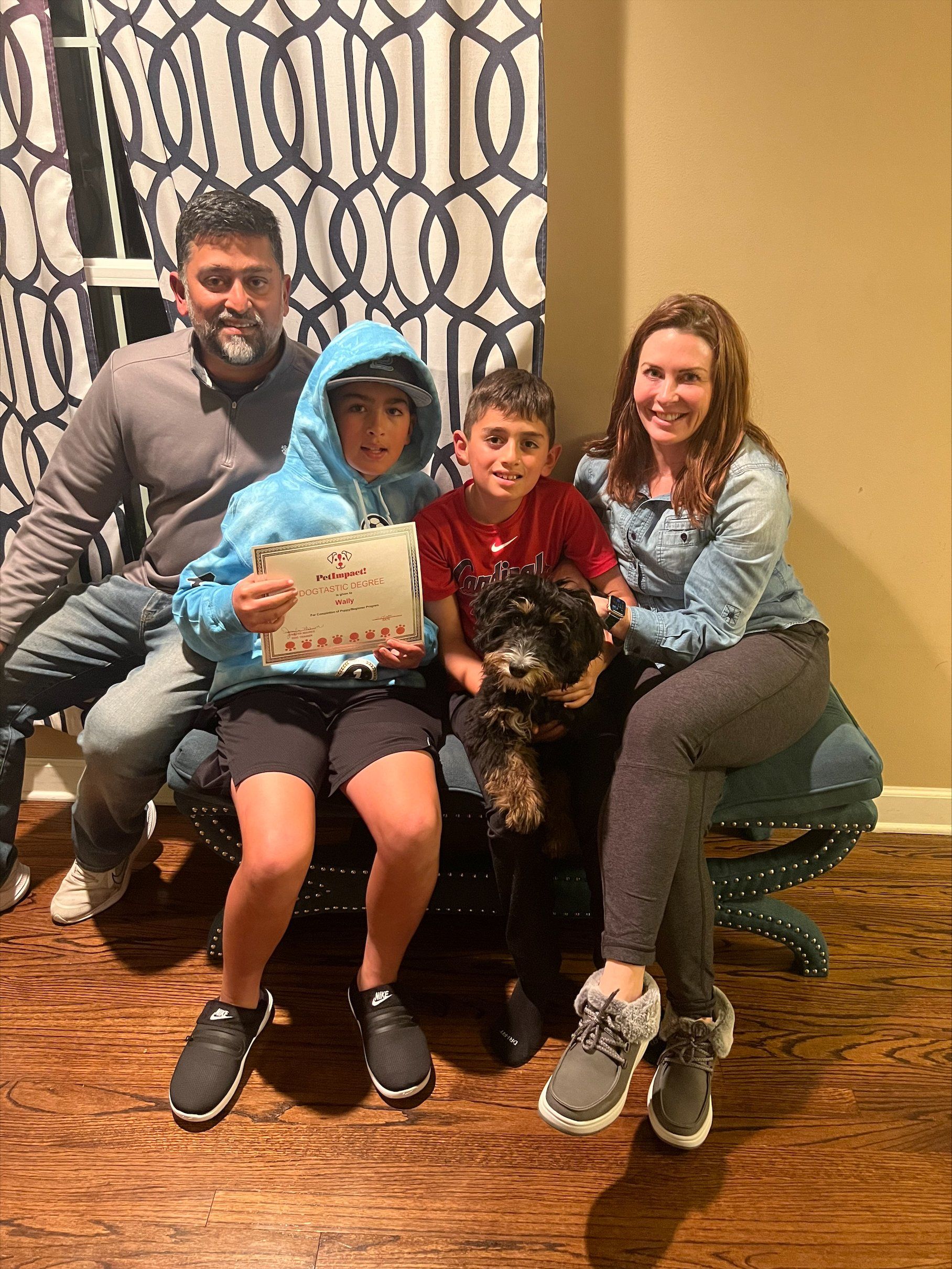 Family Picture with their Dog — St. Louis, MO — PetImpact! Dog Training