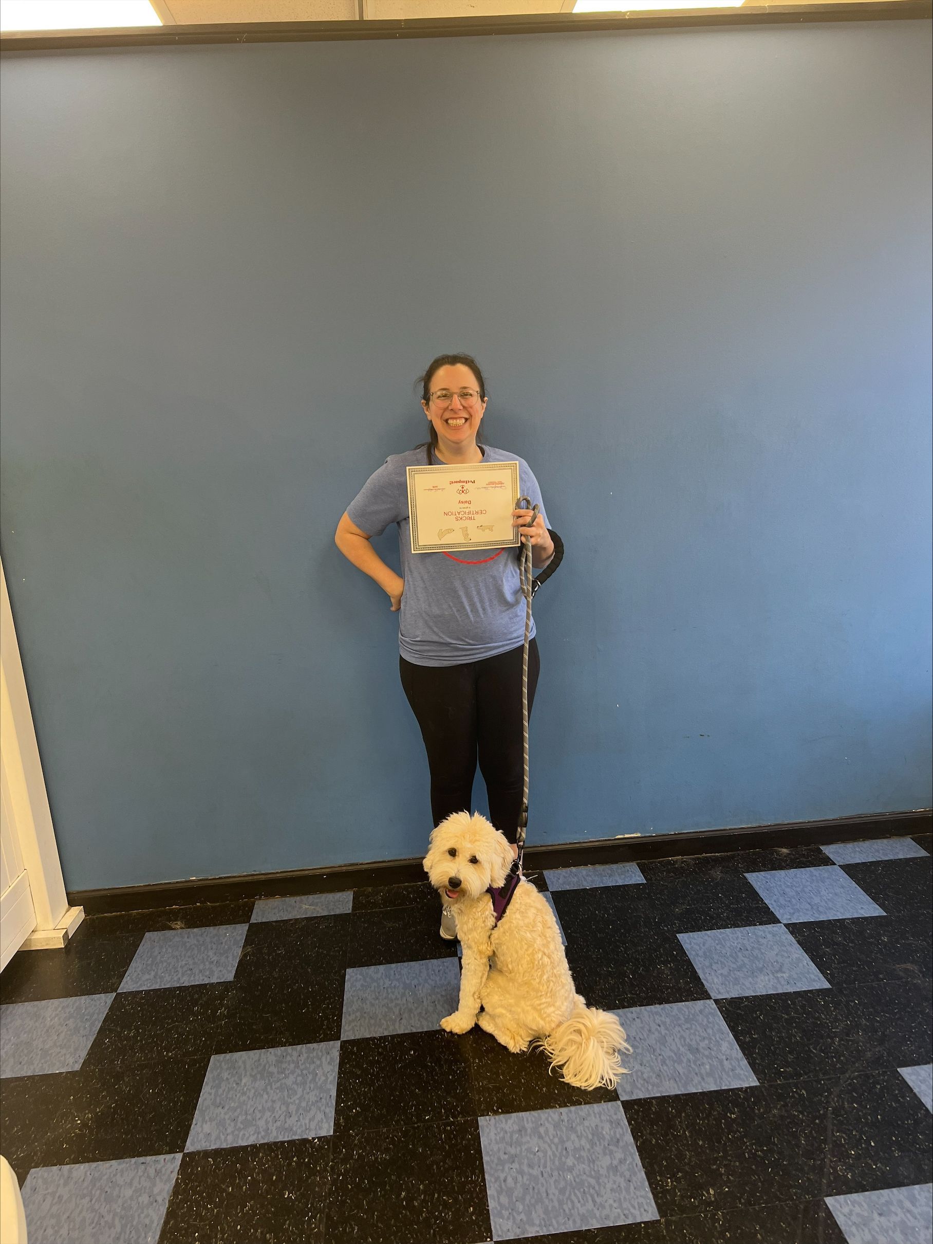 Woman Holding a Certificate With Her Dog — St. Louis, Mo — Petimpact!