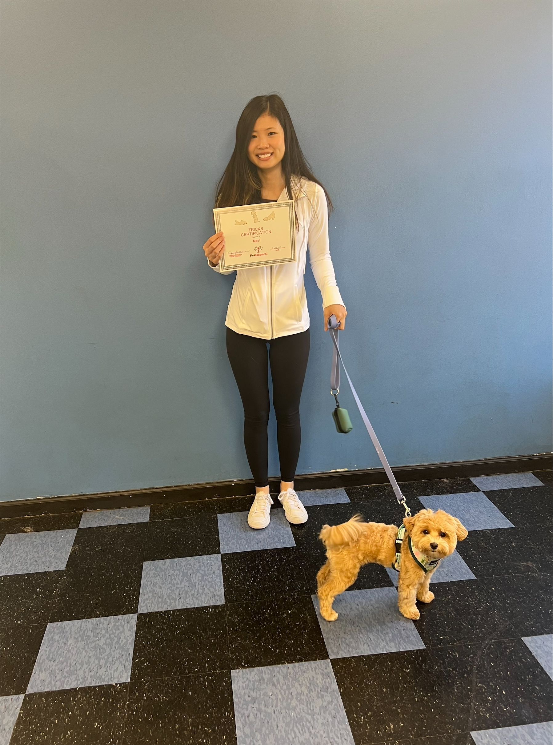 Cute Girl Holding a Certificate With Her Dog — St. Louis, Mo — Petimpact!