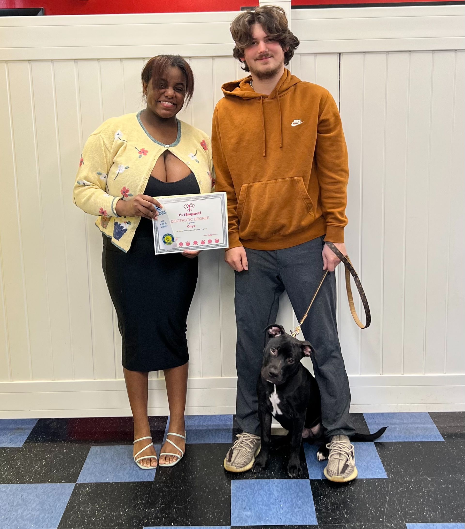 Man and Women With Their Dog — St. Louis, MO — PetImpact! Dog Training