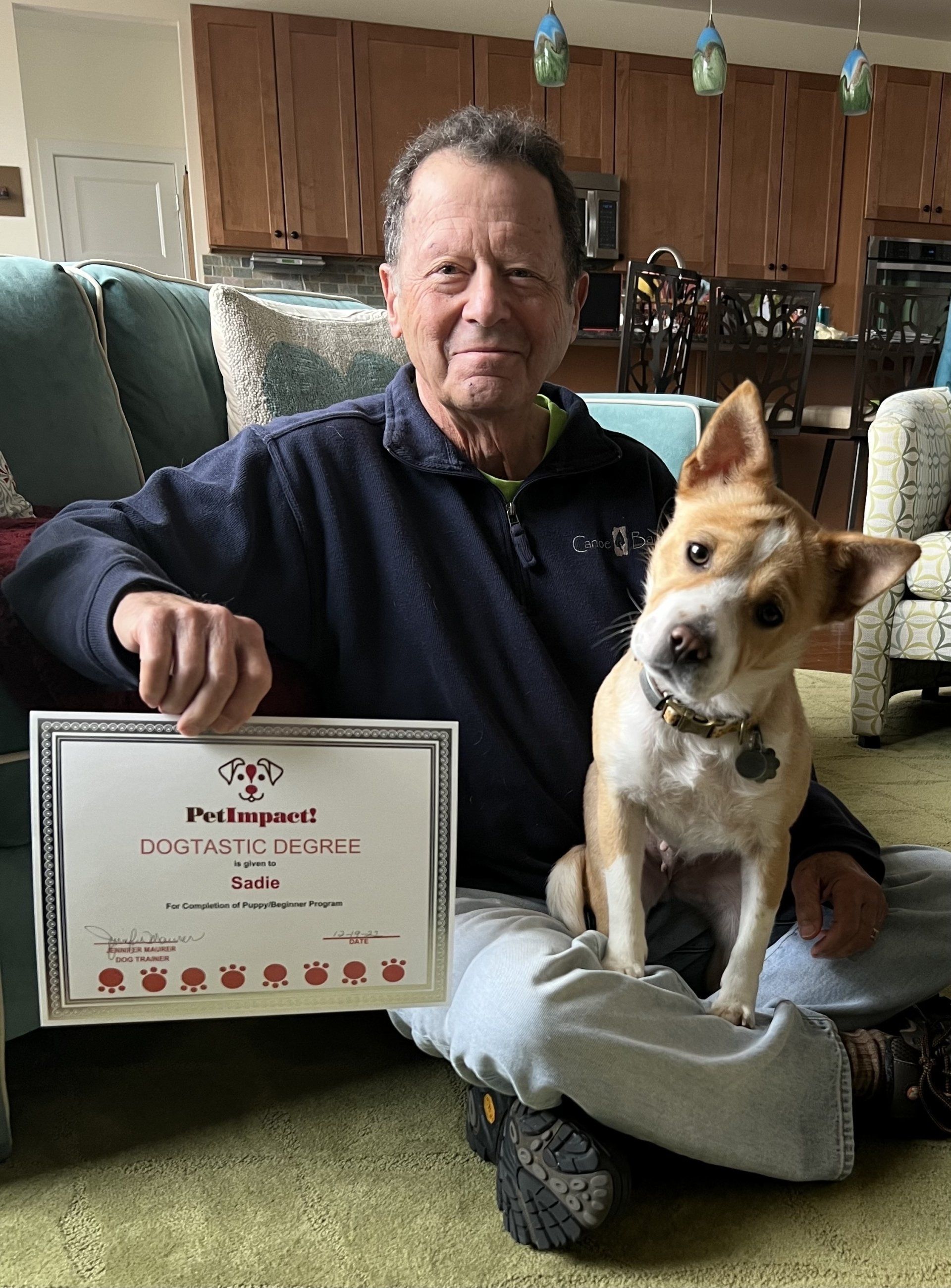 Newly Graduated Dog  with Certificate — St. Louis, MO — PetImpact! Dog Training