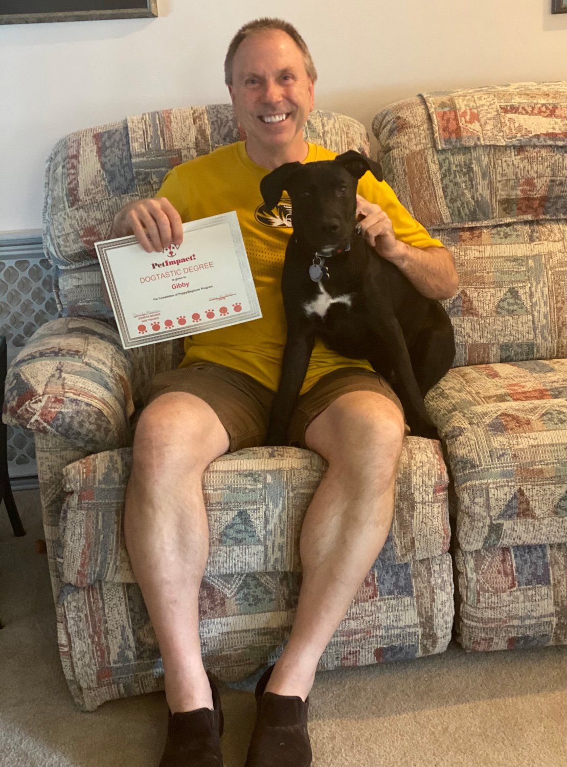 Happy Owner and Dog with Certificate — St. Louis, MO — PetImpact!