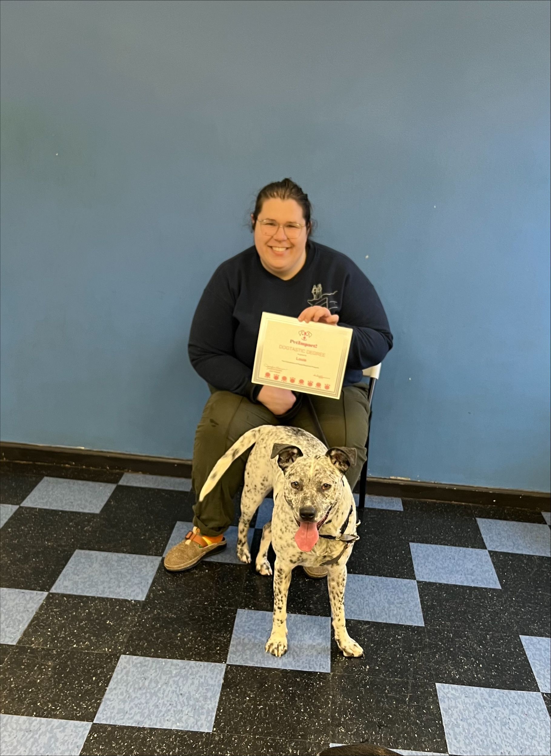 Dog and Owner with Certificate — St. Louis, MO — PetImpact!