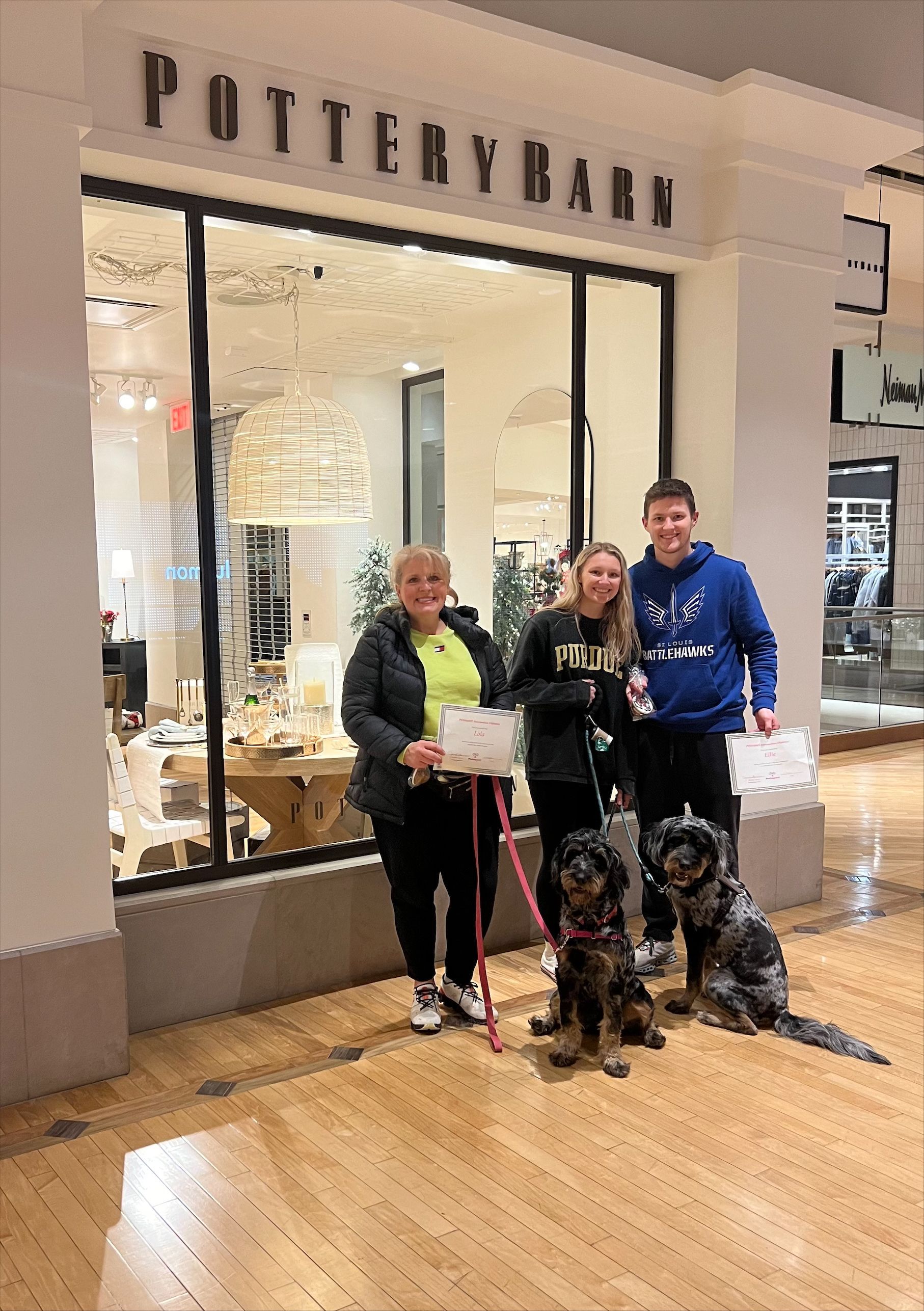 A happy family with two dogs — St. Louis, MO — PetImpact!