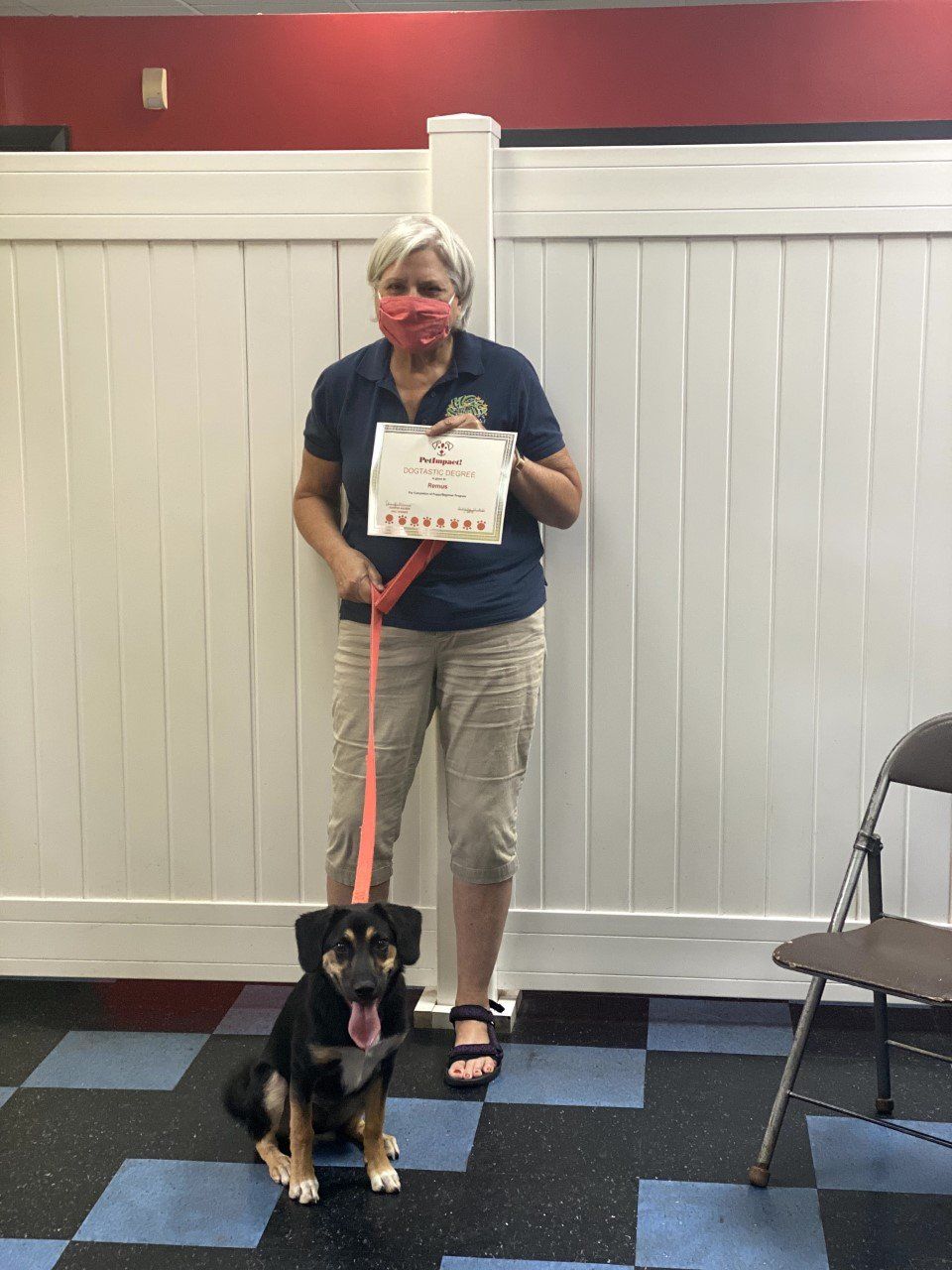 Dog Remus With Its Old Lady Owner Holding Certificate — St. Louis, MO — PetImpact!