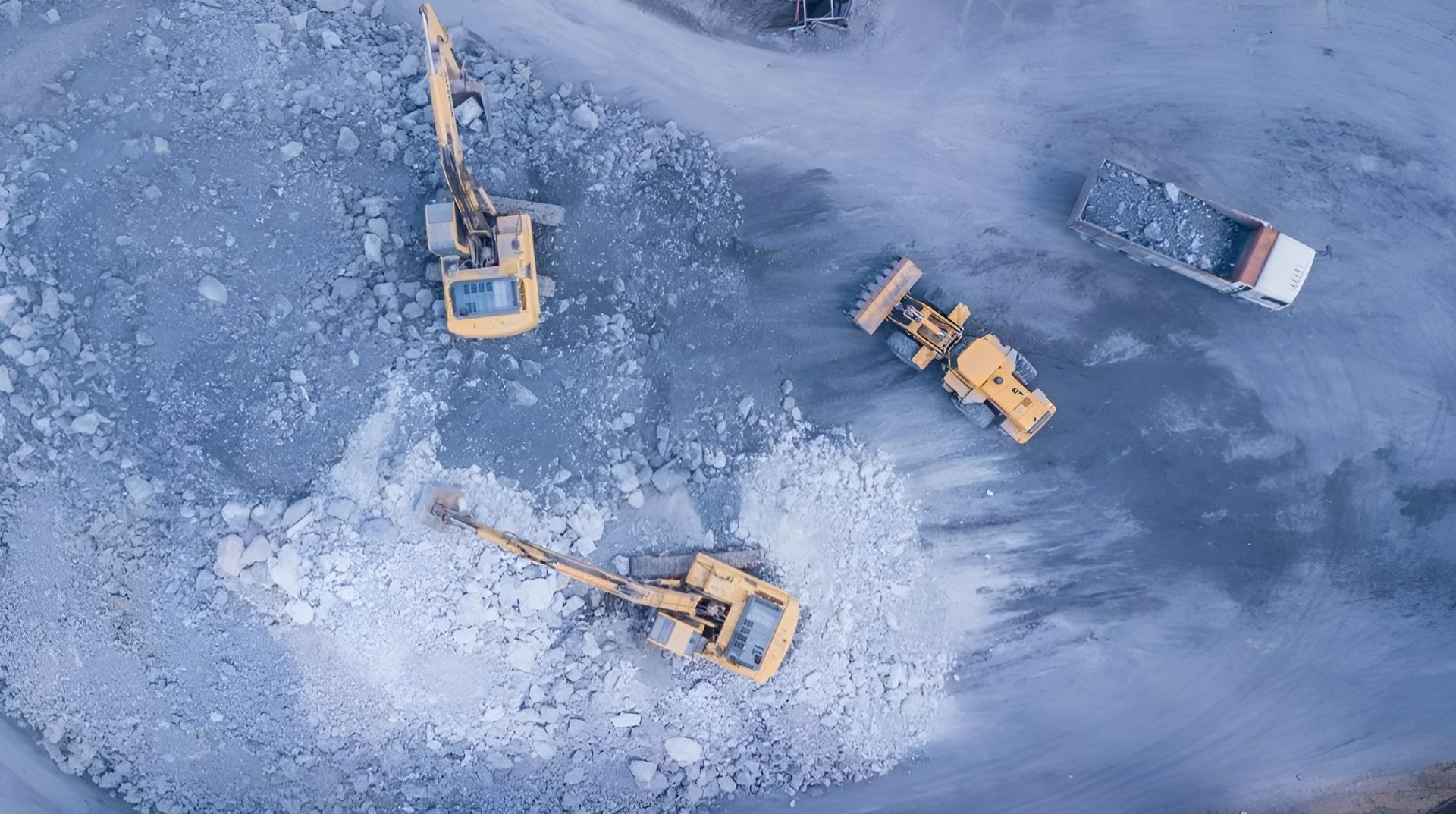 An Aerial View Of A Construction Site With Trucks And Tractors — Dubbo Hardcore Soils & Earthmoving In Dubbo, NSW