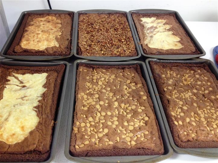 Freshly baked brownie cakes with multiple different toppings