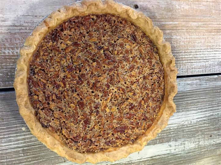 Sweet potato pie on a wooden table