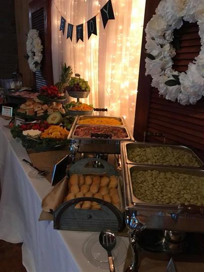 Assortment of foods consisting of Bread, Vegetables, and fruits