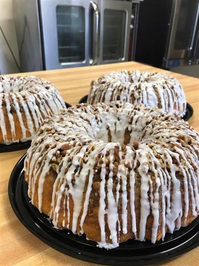 Bundt cake with icing and crumbles