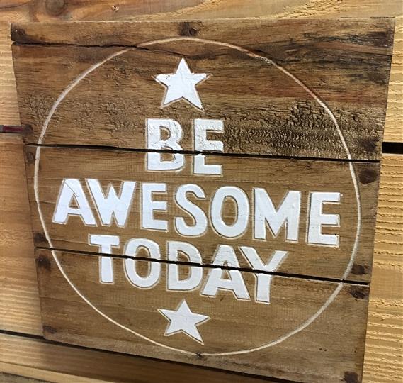 Wooden sign that reads 