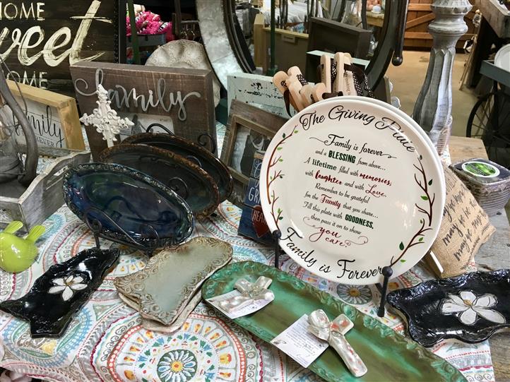 Plates and dishes for sale that have messages on them