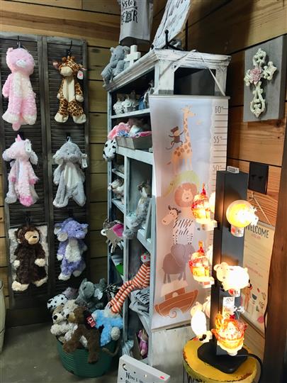 Gift shop with multiple animal plush toys and night lights