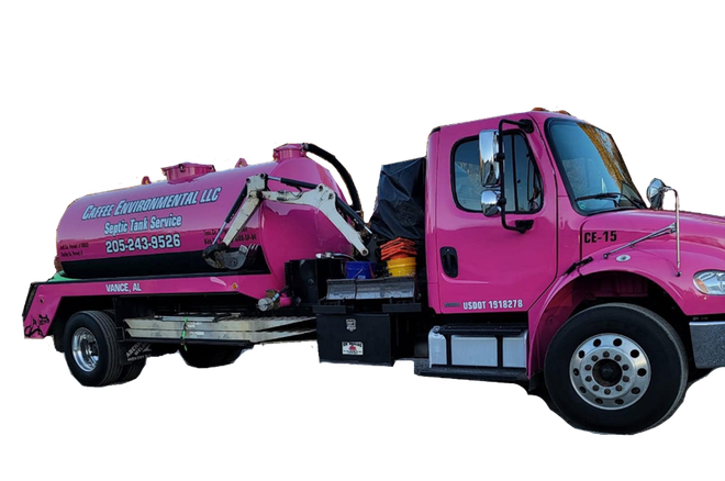 Pink septic service truck with tank and boom arm. The truck has company branding on the side.