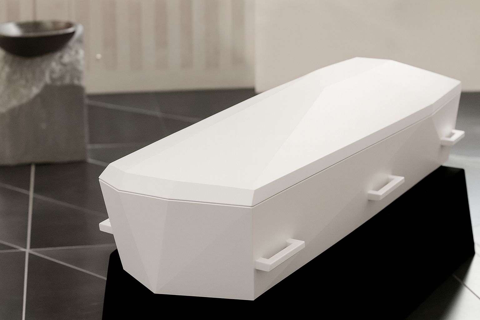 Bara bianca su una piattaforma nera in una stanza, con una ciotola scura su un piedistallo lì vicino.