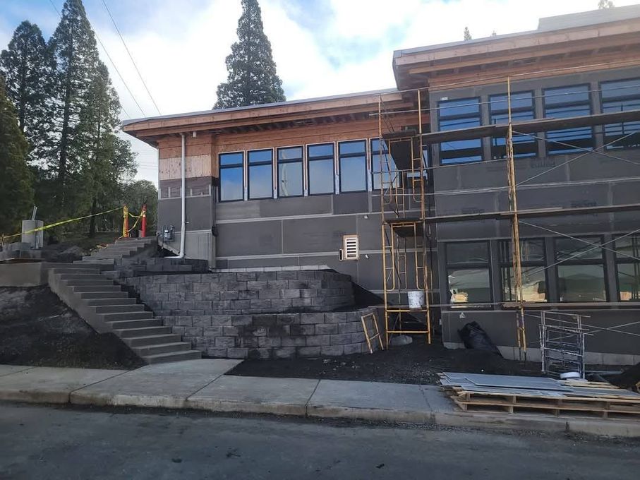 A building that is being built with scaffolding around it