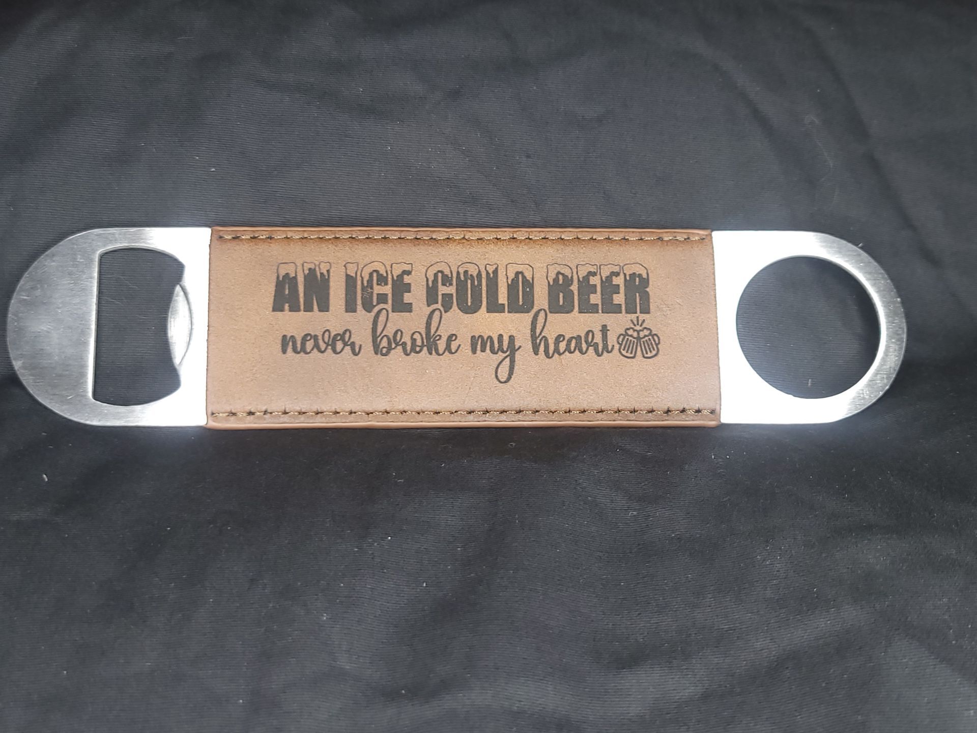 A bottle opener that says an ice could been never broke my heart