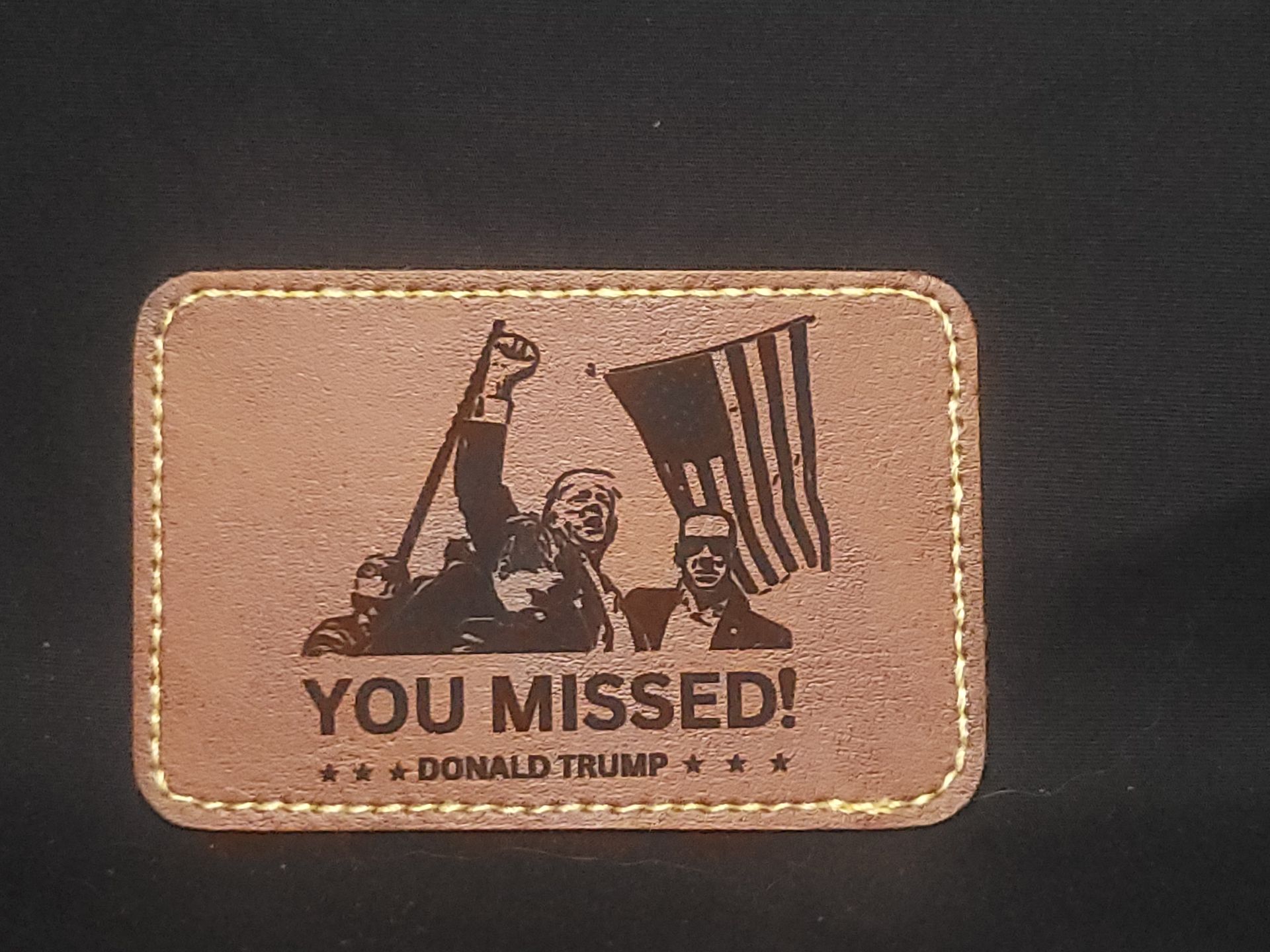 A patch that says you missed on it