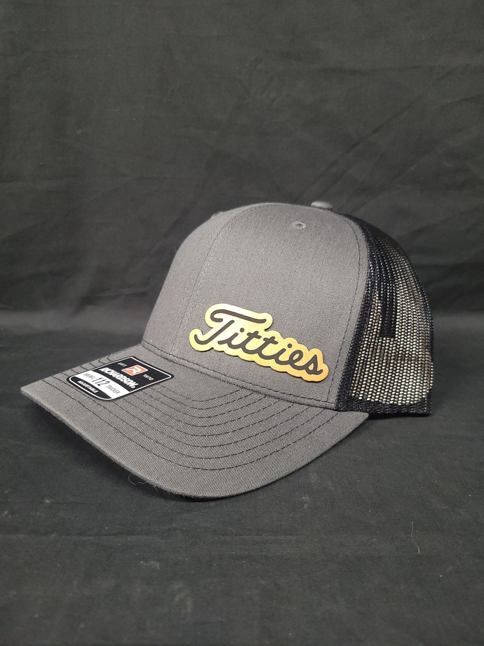 A baseball cap with the word titans on it