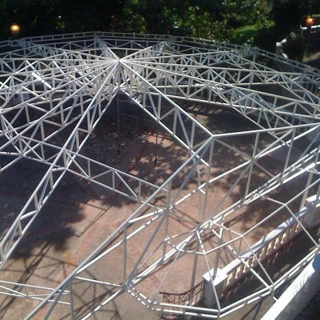 An aerial view of a ferris wheel under construction