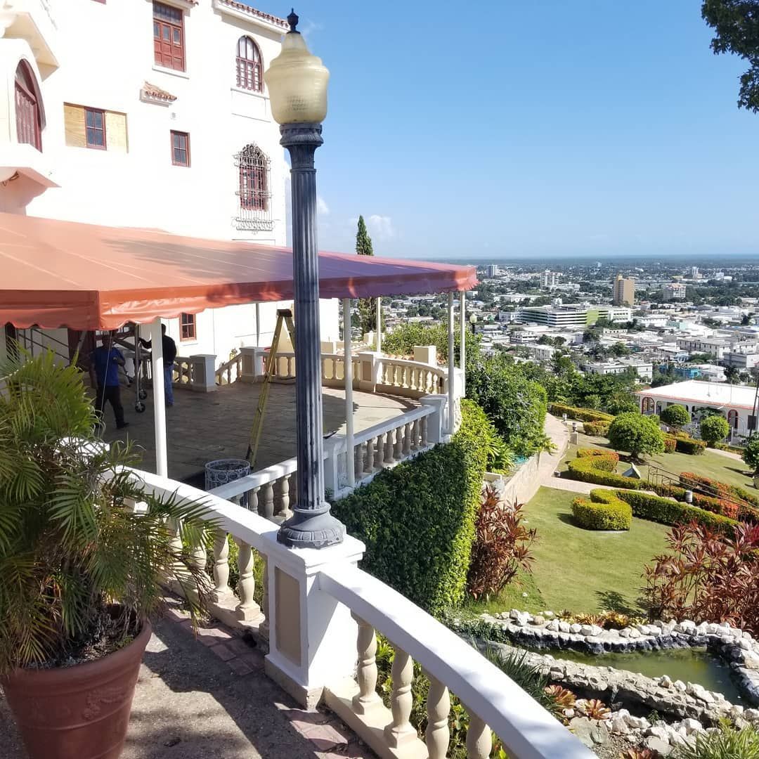 A view of a city from the balcony of a building