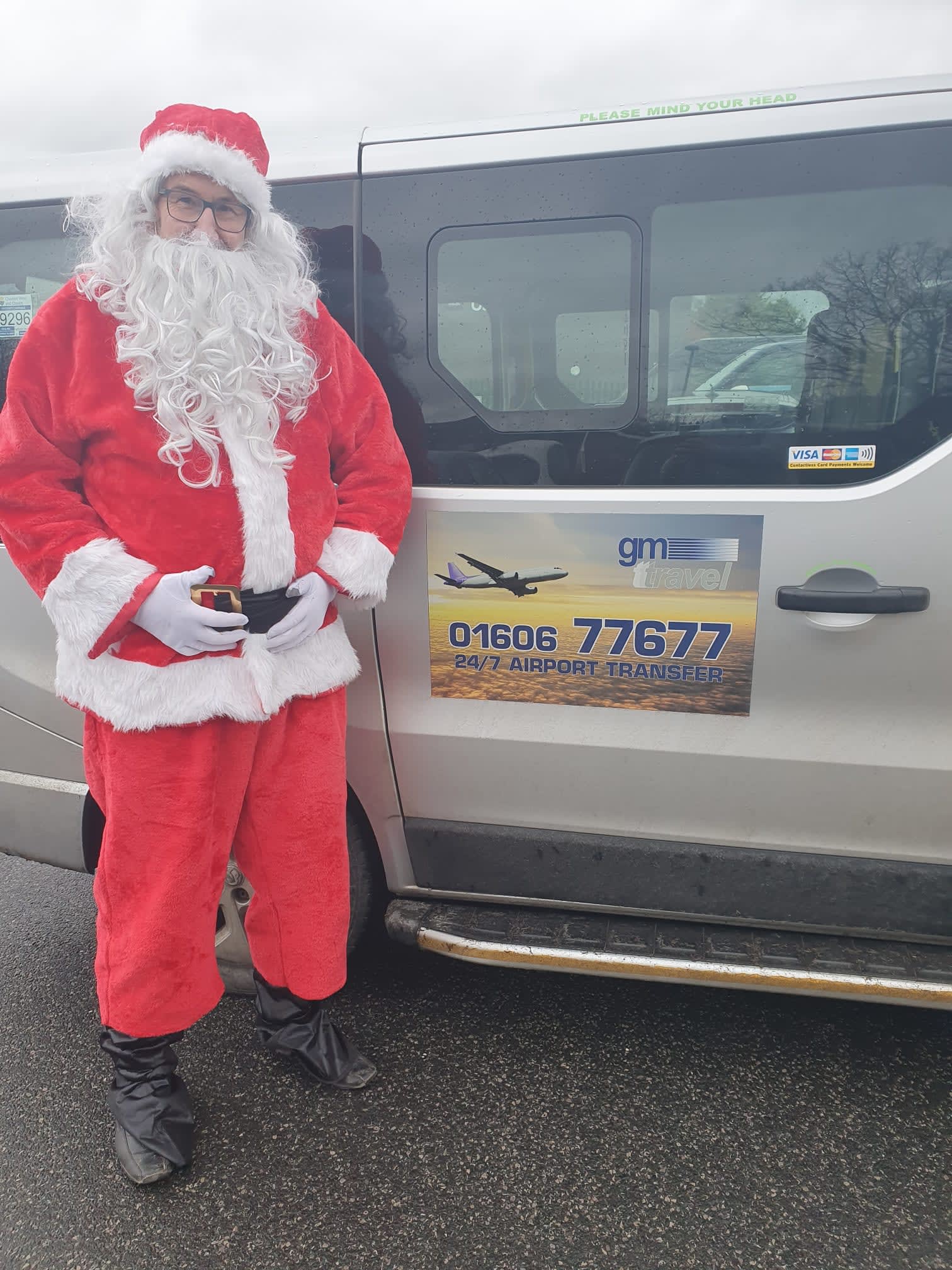 Santa stood outside taxi