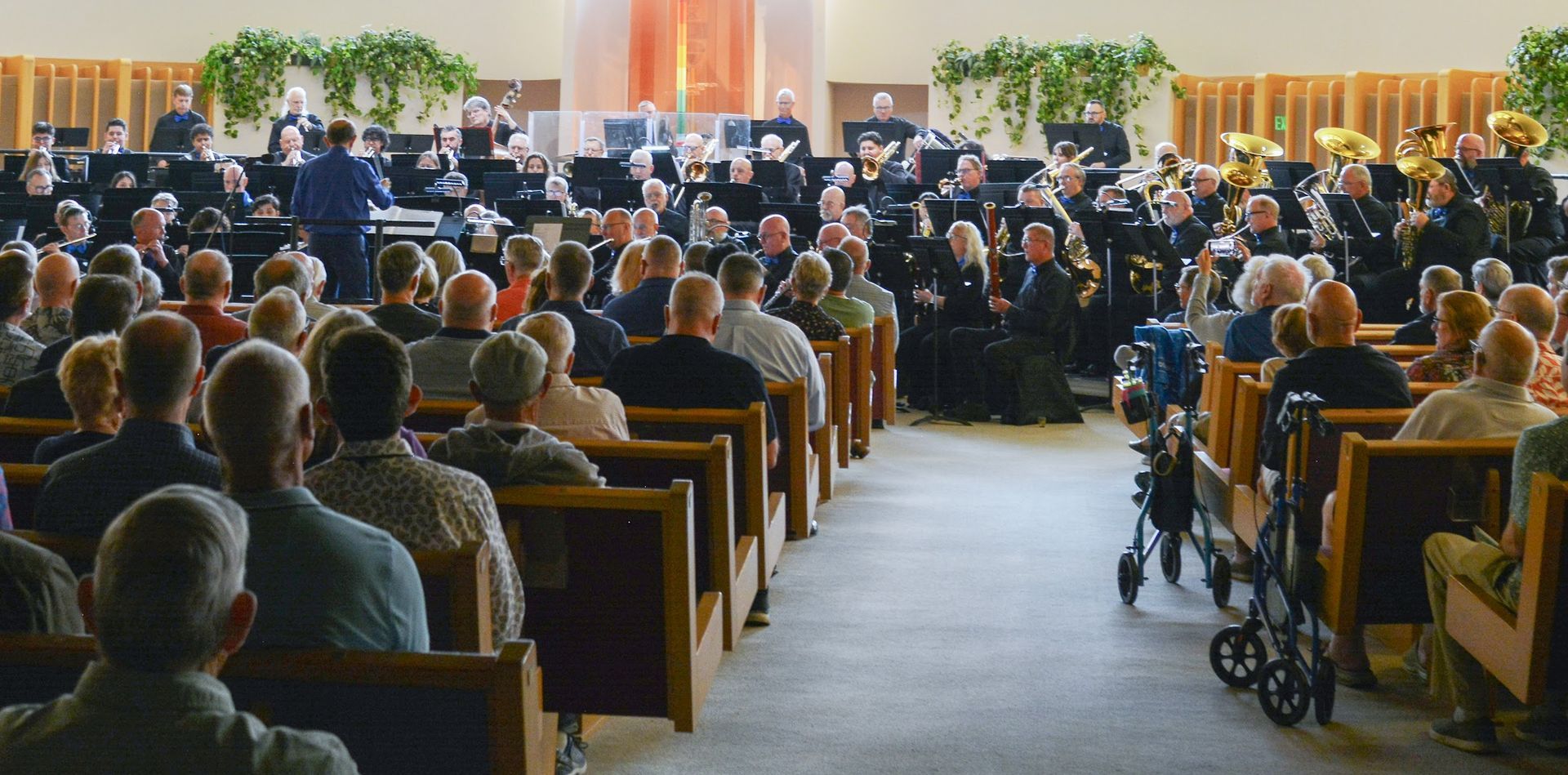 Symphonic band performing to a packed house at Temple Isaiah/Jewish Community Center