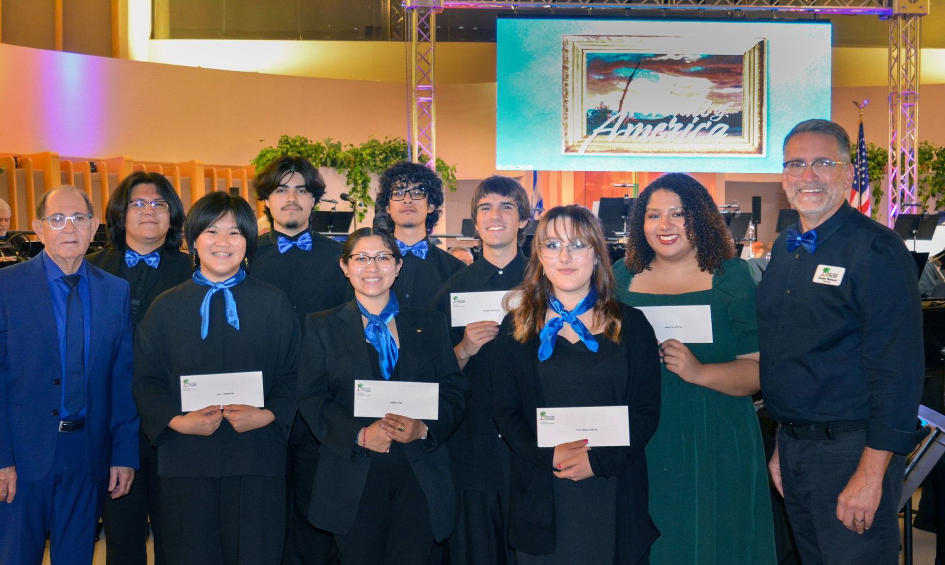 Photo of our 10 music scholarship winners last year with our president and artistic director.